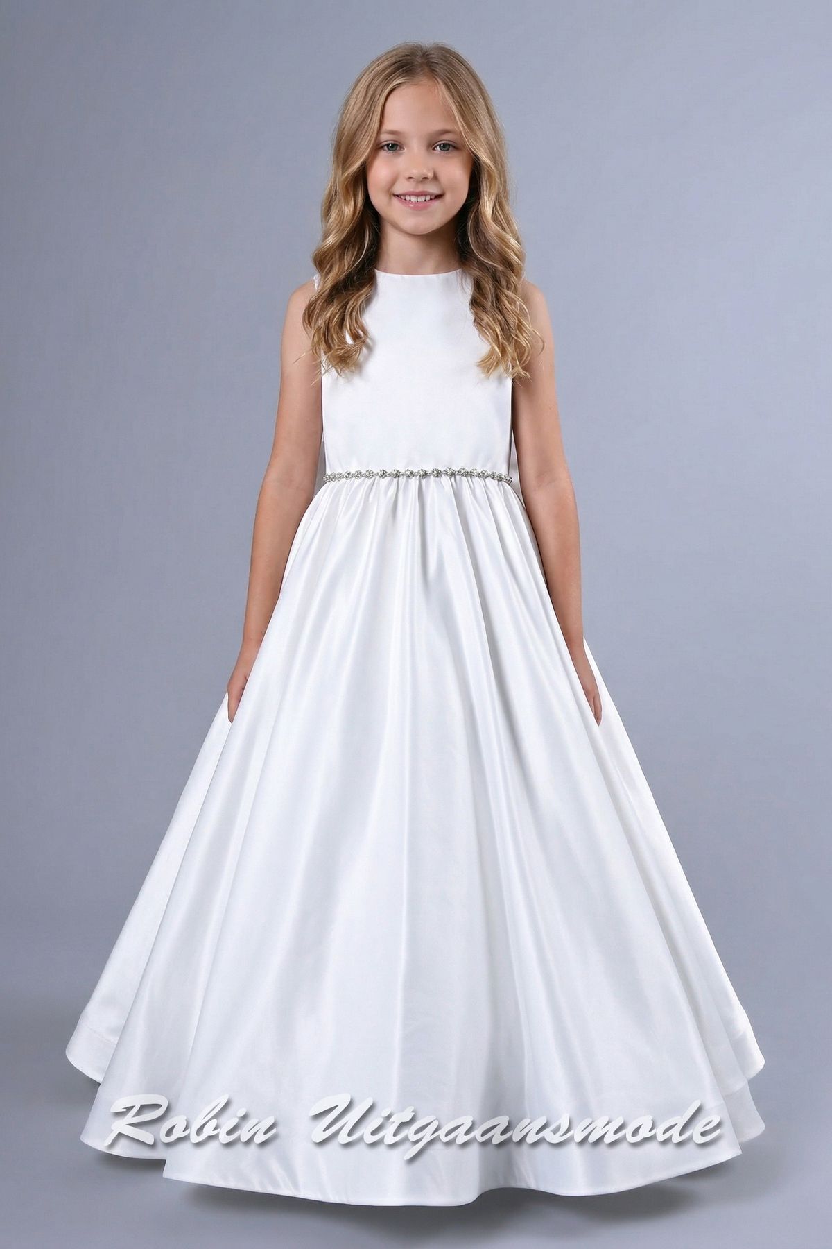 Petticoat bloemenmeisjesjurk met gladde satijnen stof, een grote strik op de rug en sprankelende tailleband