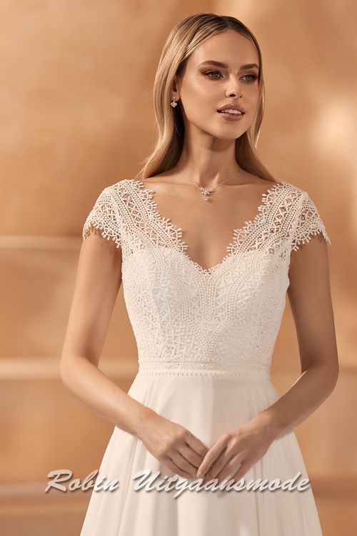 Close-up van de Liefelijke Trouwjurk met kanten lijfje, V-hals en rugdecolleté