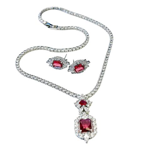 Gatsby look sieradenset met fuchsia hanger en oorbellen