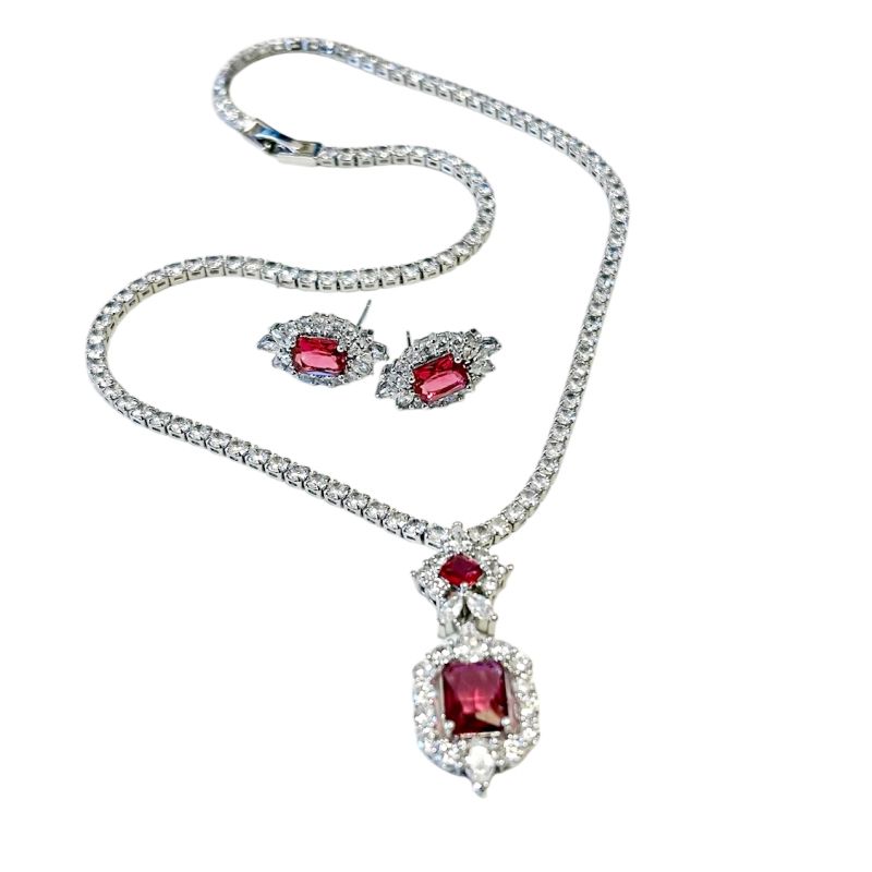 Gatsby look sieradenset met fuchsia hanger en oorbellen